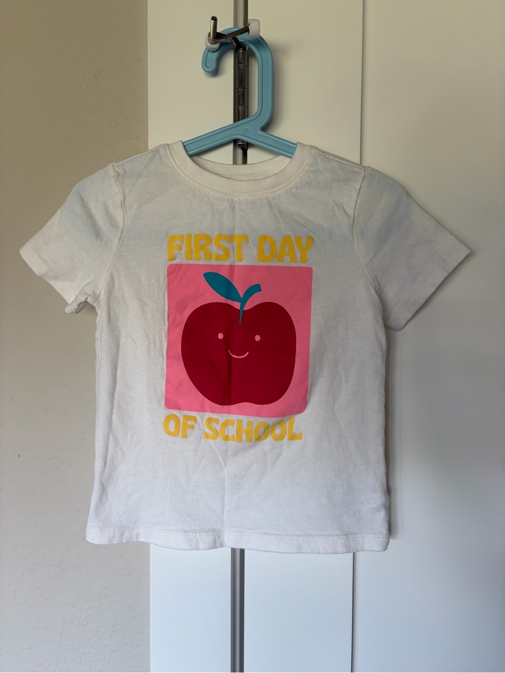 Old Navy White Tee with Red Apple and Yellow Text